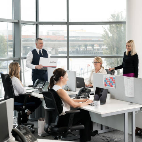 Staffline team members working in their office